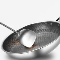 Stainless steel frying pan with non-stick coating for effortless cooking